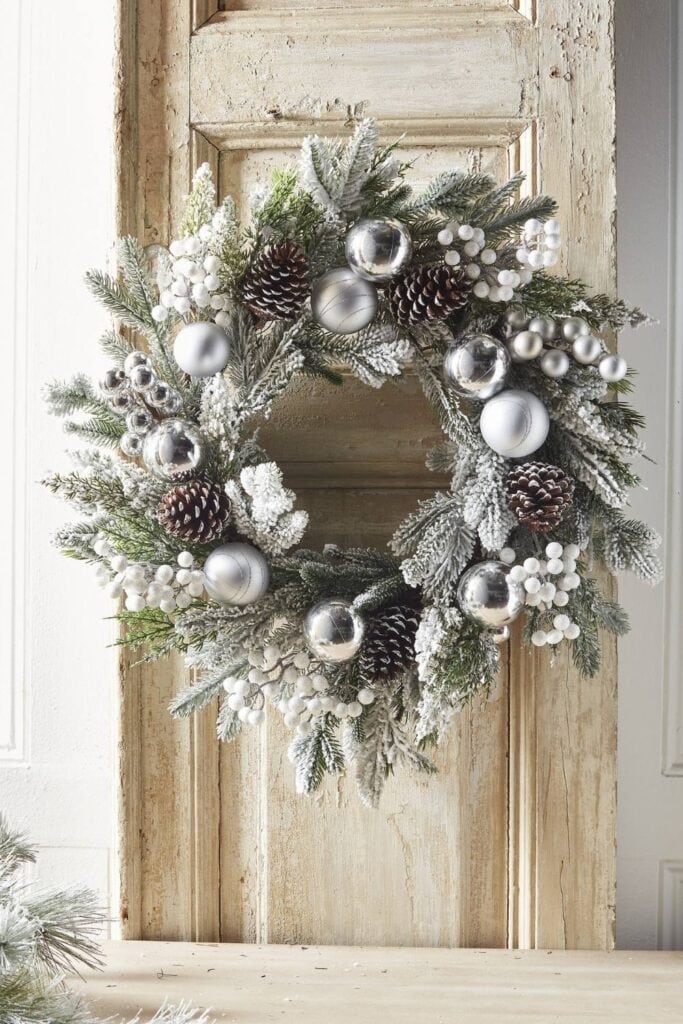 winter frost theme from raz, wreath with frosted greenery, silver balls in matte and shiny, white berries