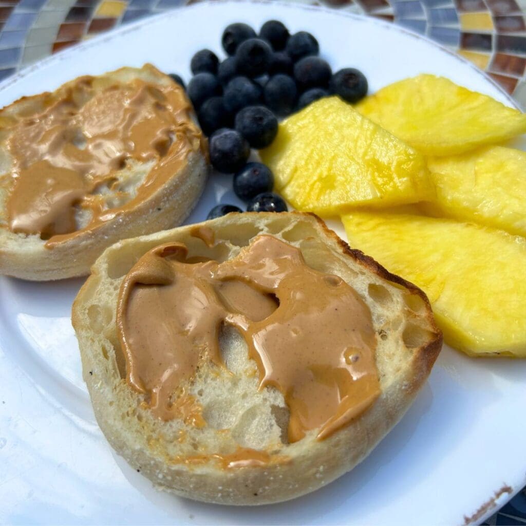 bays english muffins with peanut butter, pineapple, and blueberries