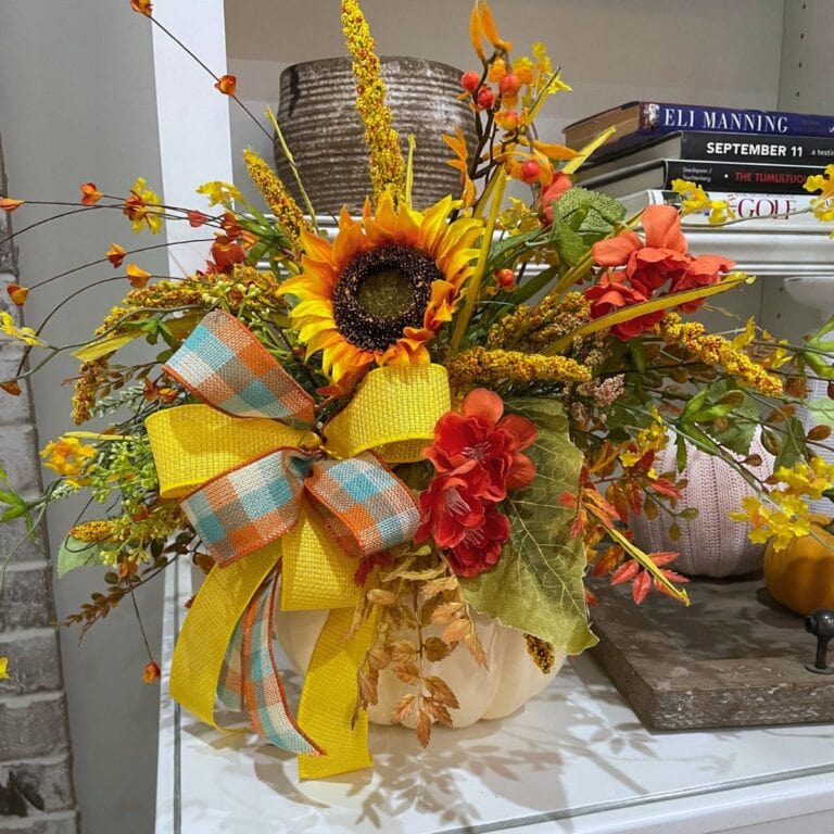 fall floral arrangement made in a white foam pumpkin