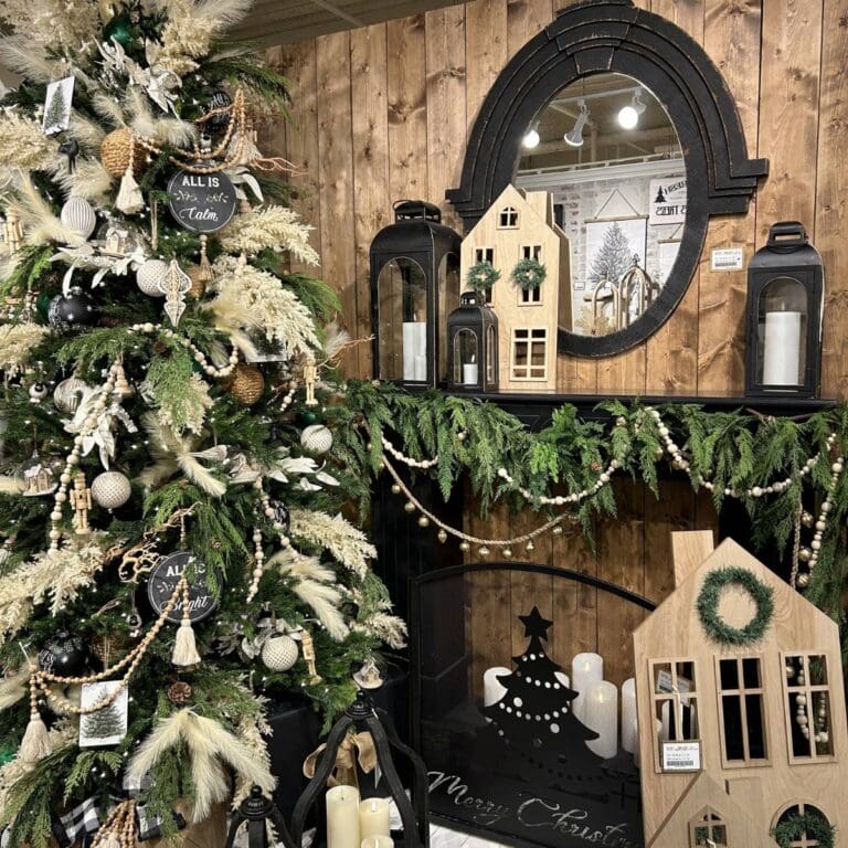 all is calm Christmas tree from RAZ decorated with creamy picks and sprays, chalkboard ornaments, wood beads and tassels, plain wood nutcrackers
