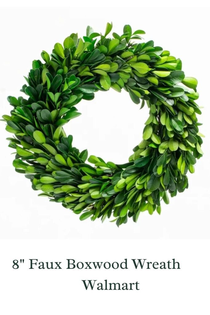 small boxwood wreath that could be placed on a dinner plate for decoration