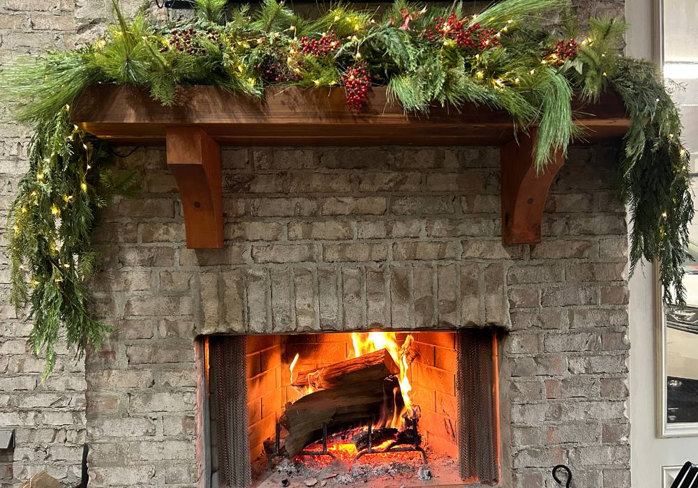 fresh cedar, faux pine garland for outdoor mantel