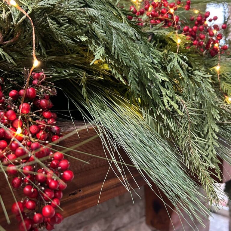 fresh cedar, faux pine garland for outdoor mantel