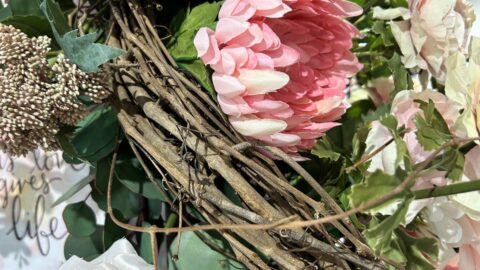 spring garland with grapevine twig intertwined