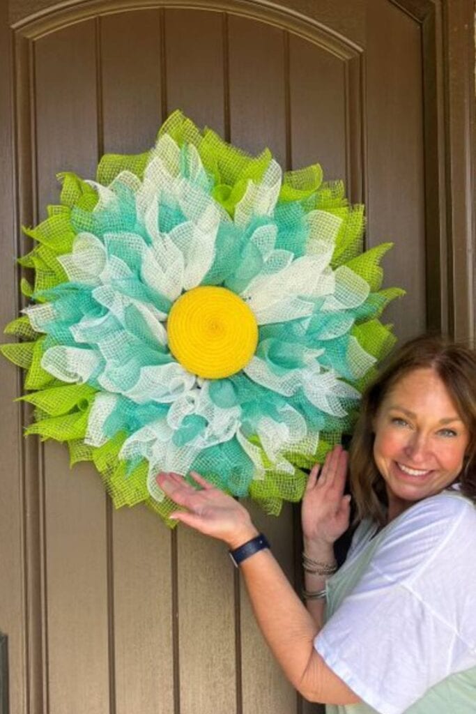 blue and white flower wreath made with fabric mesh