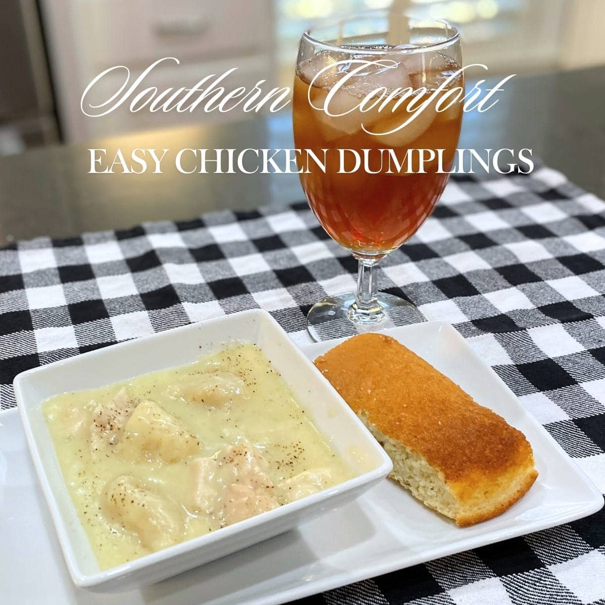 southern homemade chicken and dumplings with cornbread and a glass of sweet tea