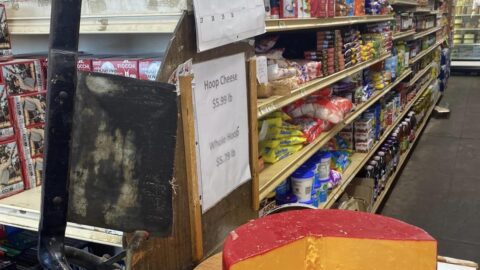 a round of hoop cheese with cutter ar the williams brothers general store