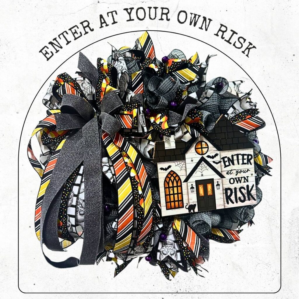 Halloween wreath with an Enter at Your Own Risk Sign