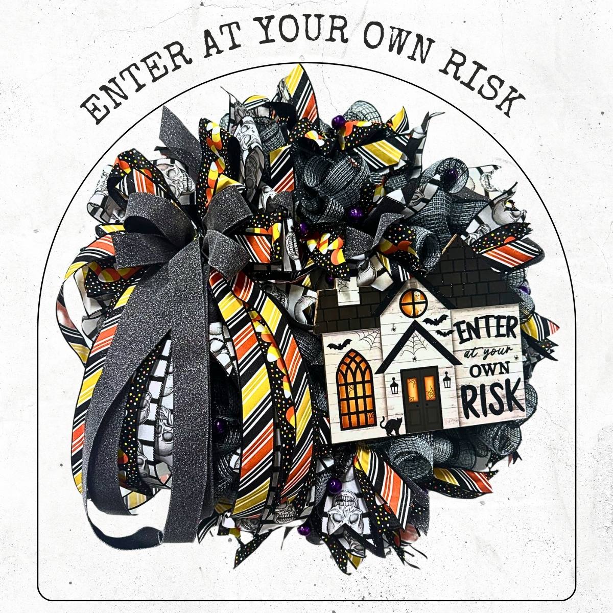 Halloween wreath with an Enter at Your Own Risk Sign