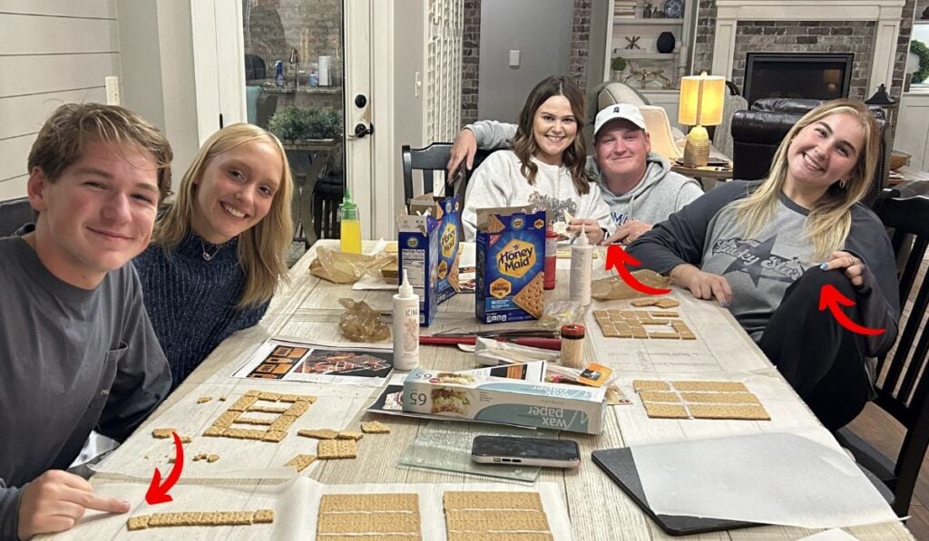 grandkids making gingerbread houses