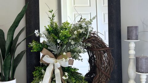 spring wreath decor, wreath positioned in front of a mirror for a fresh look