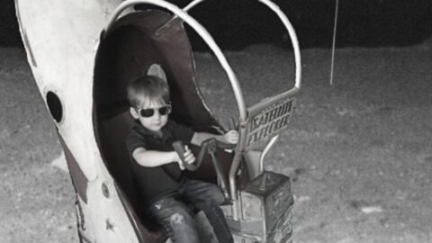 matt in a rocket kiddie ride