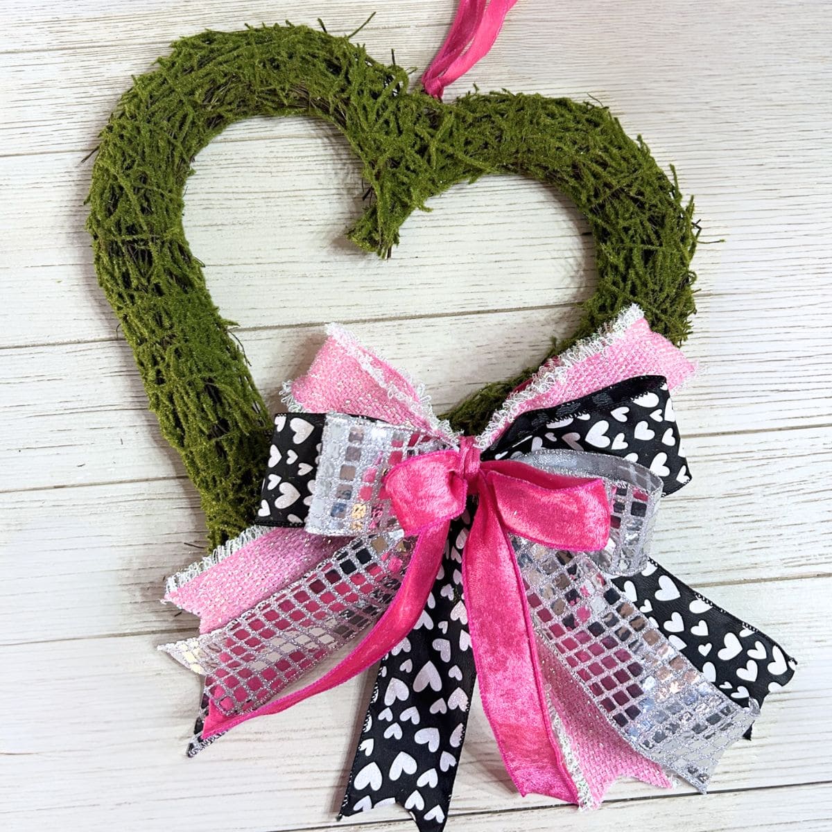 Valentine's bow for a green mossy heart wreath form