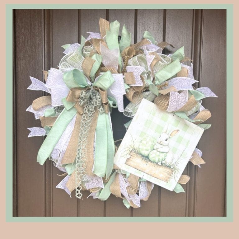 Sage Green Easter wreath with soft subtle shades of sage green and an exclusive Trendy Tree checked bunny sign with vintage touch