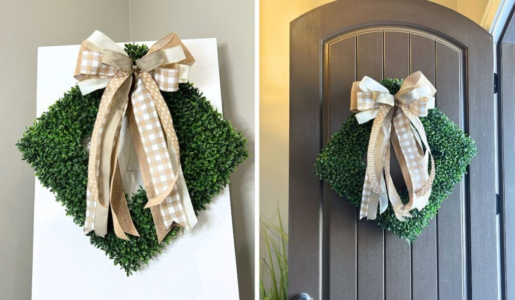 neutral bow on a boxwood wreath on a work board and front door