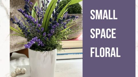 small space floral arrangement white and black vases with purple foxtail