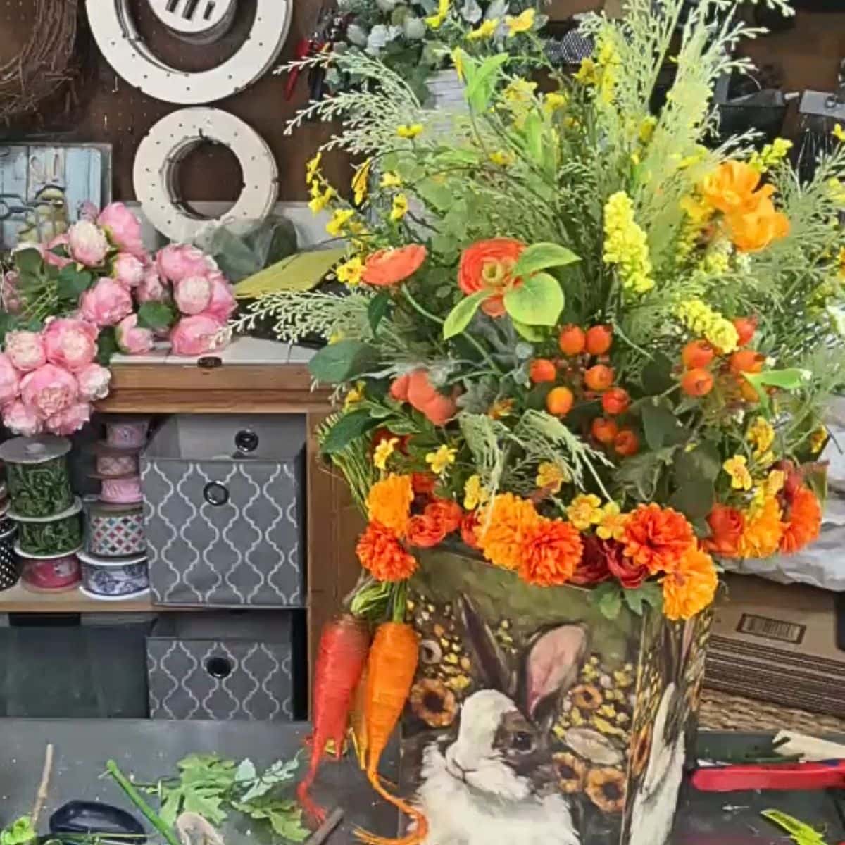 spring floral in a bunny bucket from Trendy Tree, created by Dona of On a Whimm Wreaths & Decor
