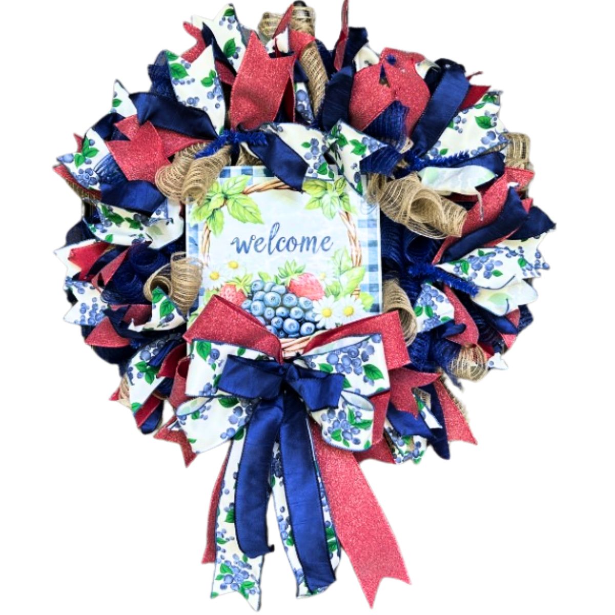 summer berry patriotic mesh wreath in red white and blue with a blueberry and strawberry welcome sign