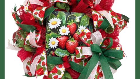 mesh wreath with strawberries and daisies sign