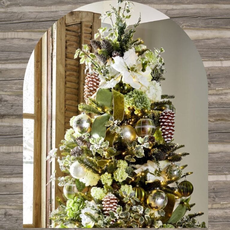 Rustic Christmas Tree Ideas - tree decorated with hydrangeas, frosted pinecones, snowy berries, shiny and matte balls, white poinsettias, iced greenery