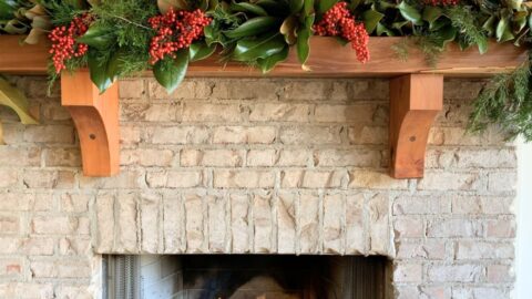 tutorial on how to make a fresh greenery garland for outdoor mantel using Magnolia, Cedar and Pine branches