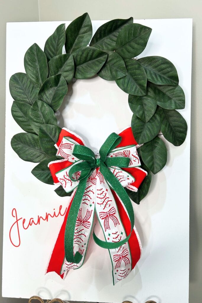 Updated Magnolia wreath with simple bow using Christmas ribbons