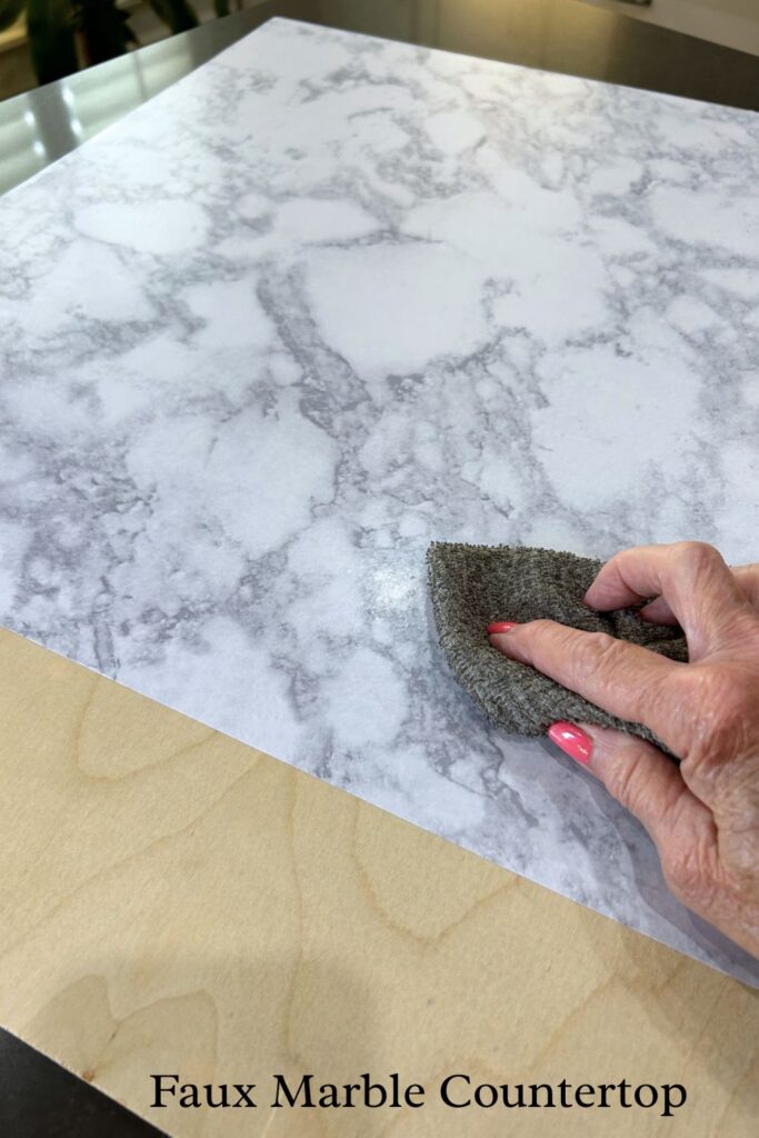 smoothing air bubbles out of shelf liner