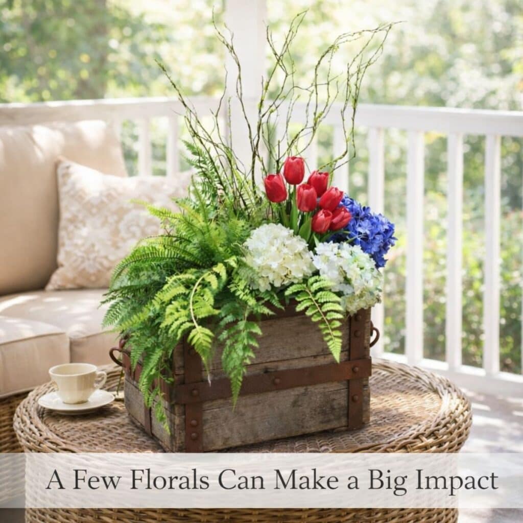 Floral arrangements in an old wooden crate showing how a few florals can make a big impact