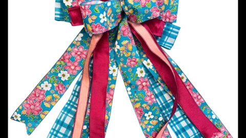 Wreath bow made with multiple sizes and styles of ribbon using the Em's Bow & Go foldable bowmaker from Trendy Tree.